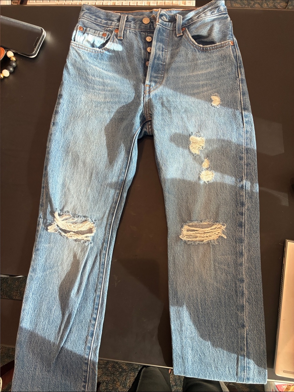 Woman’s Levi Distressed Blue Jeans